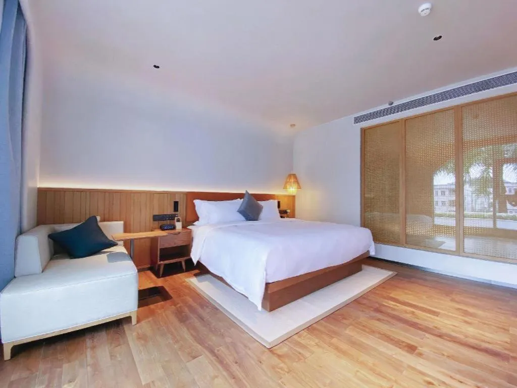 Bed in Dongguan Castfast Hotel