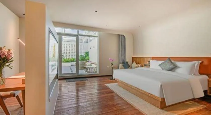 Bed in Dongguan Castfast Hotel