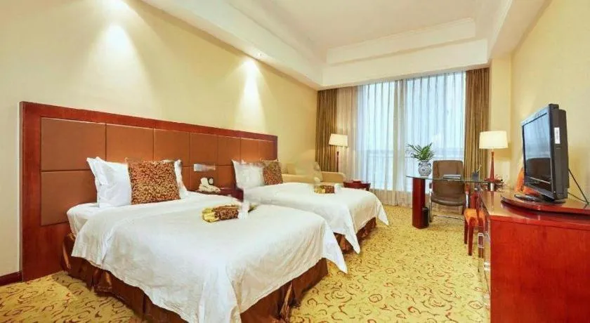 Bed in Qingdao Chengyang Detai Hotel