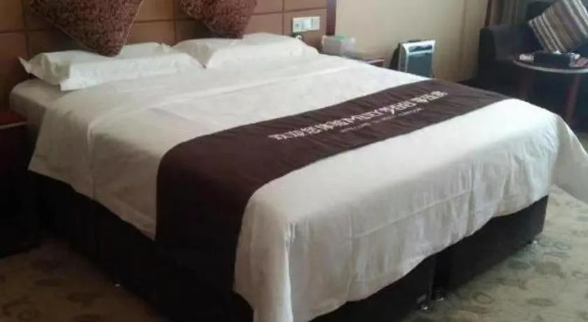 Bed in Qingdao Chengyang Detai Hotel