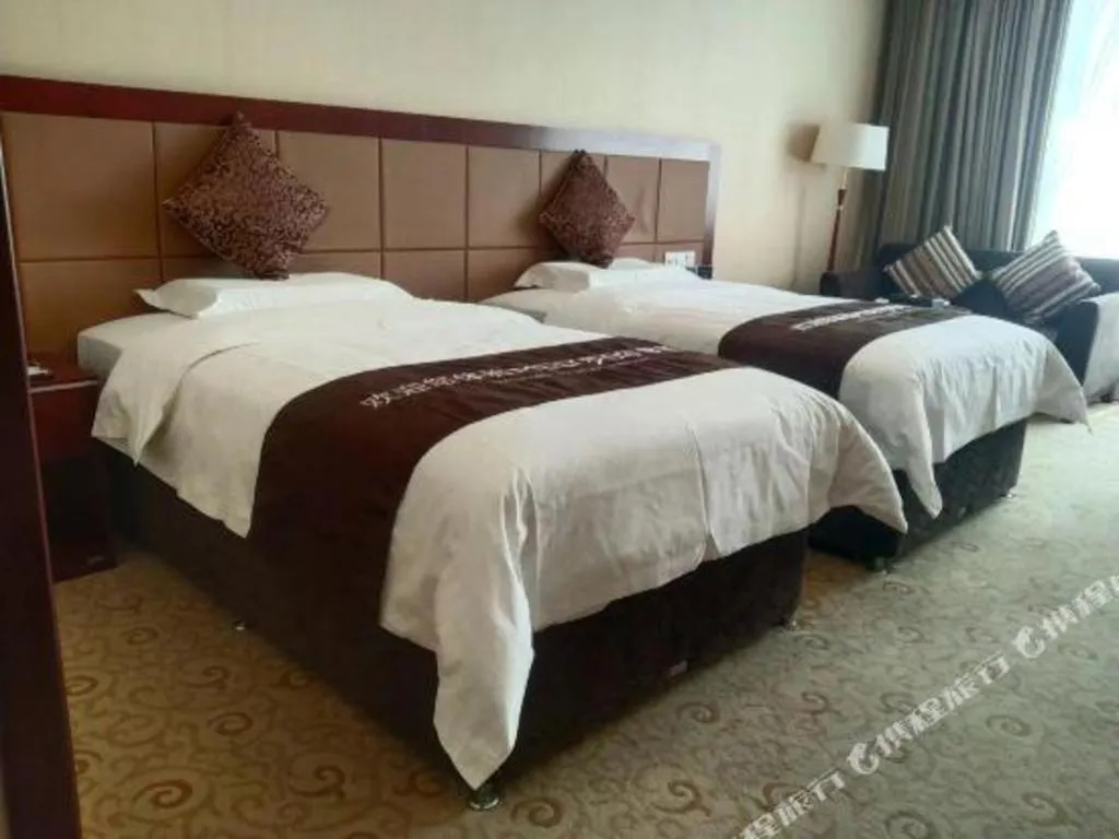 Bed in Qingdao Chengyang Detai Hotel