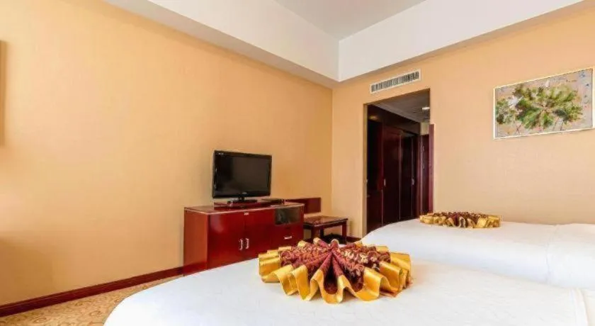 Bed in Qingdao Chengyang Detai Hotel