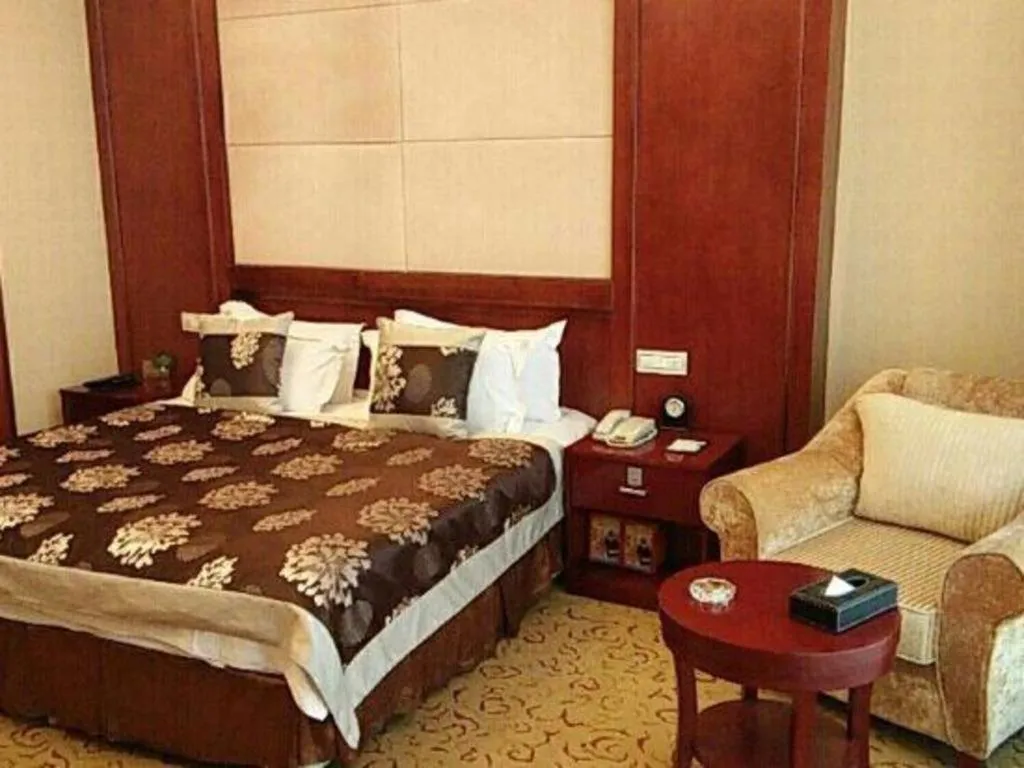 Bed in Qingdao Chengyang Detai Hotel