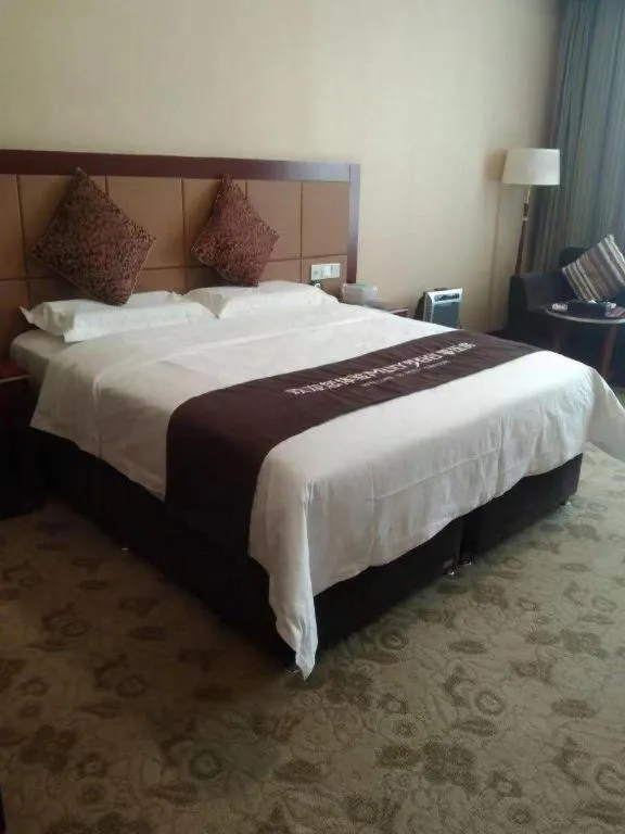 Bed in Qingdao Chengyang Detai Hotel