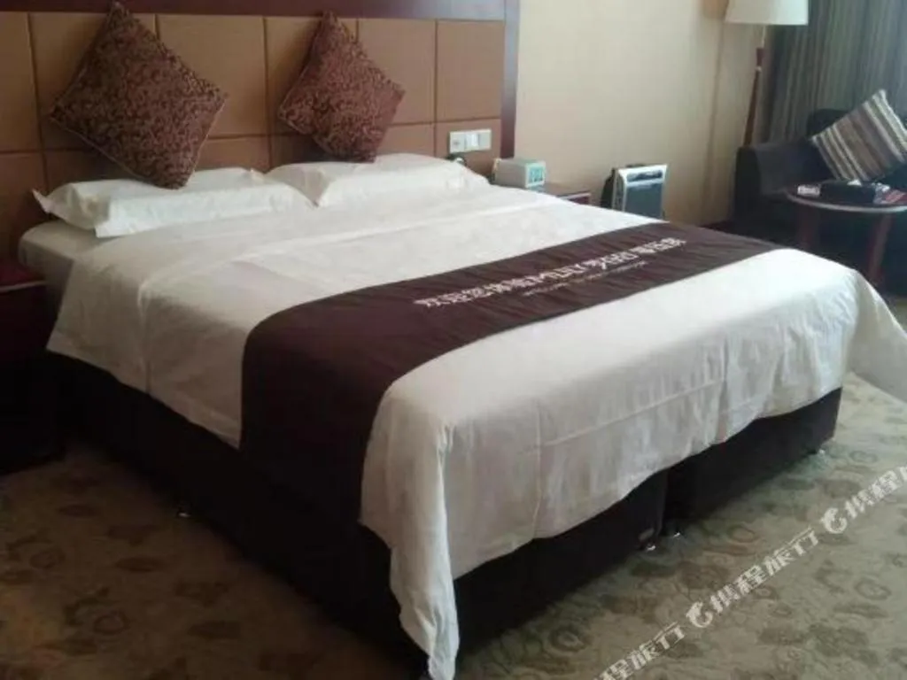 Bed in Qingdao Chengyang Detai Hotel