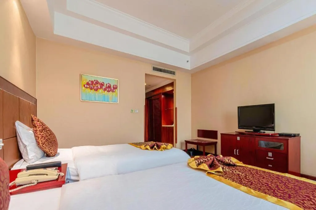 Bed in Qingdao Chengyang Detai Hotel