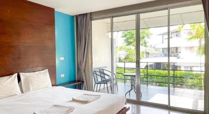 Bed in The Living Pool Villas