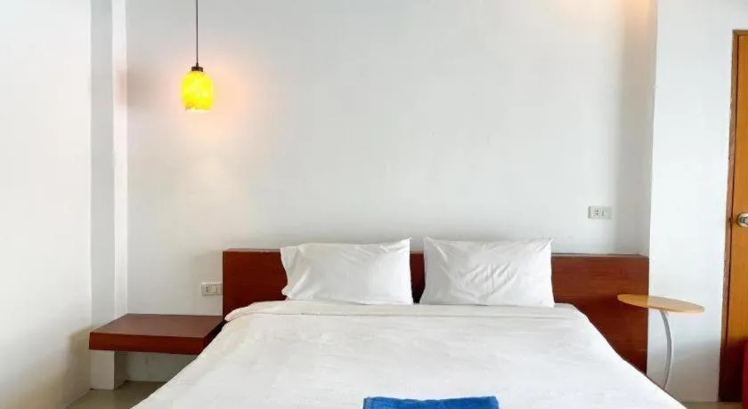 Bed in The Living Pool Villas