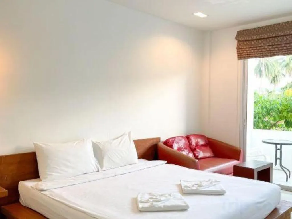 Bed in The Living Pool Villas