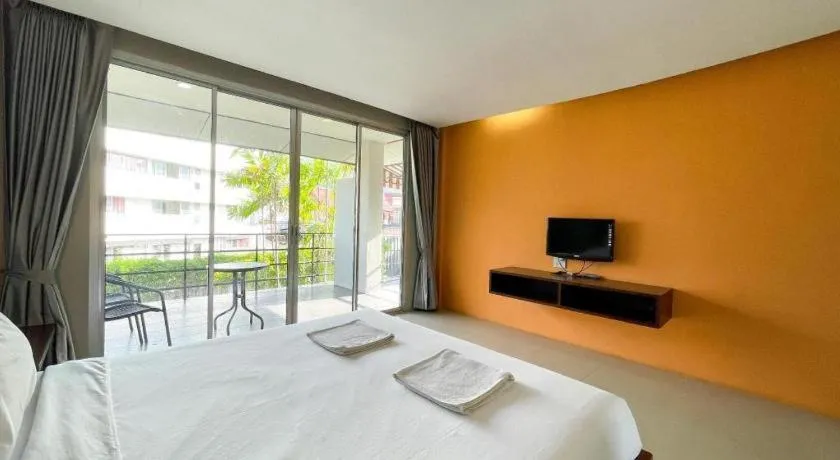 Bed in The Living Pool Villas