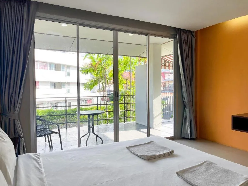 Bed in The Living Pool Villas