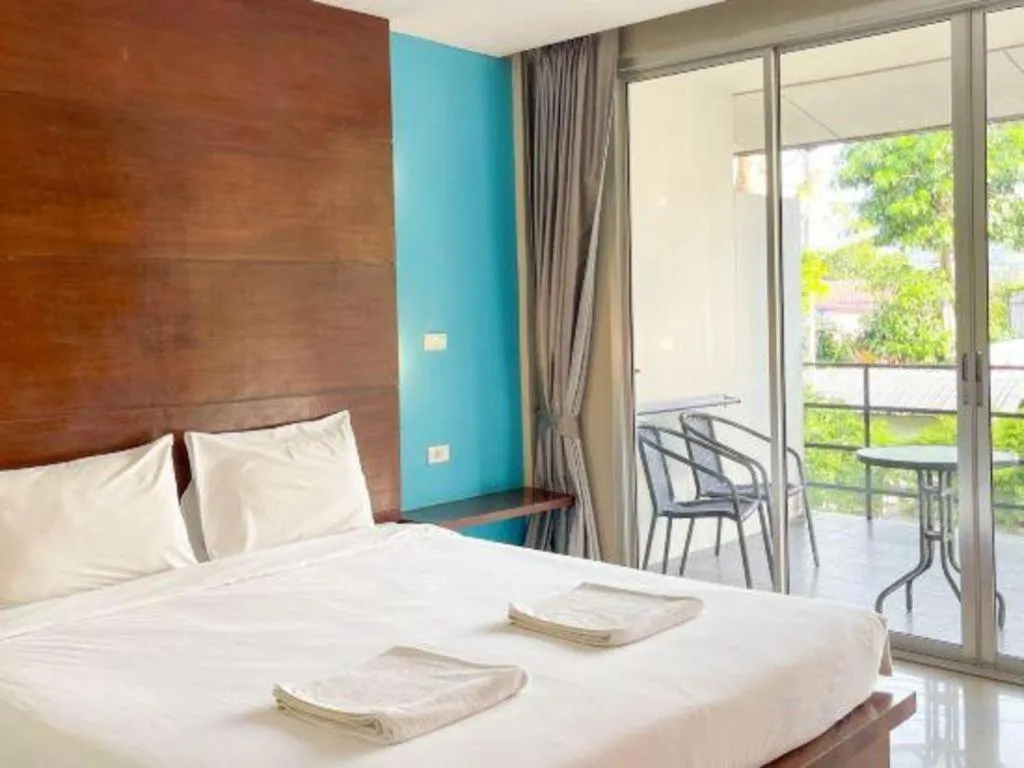 Bed in The Living Pool Villas