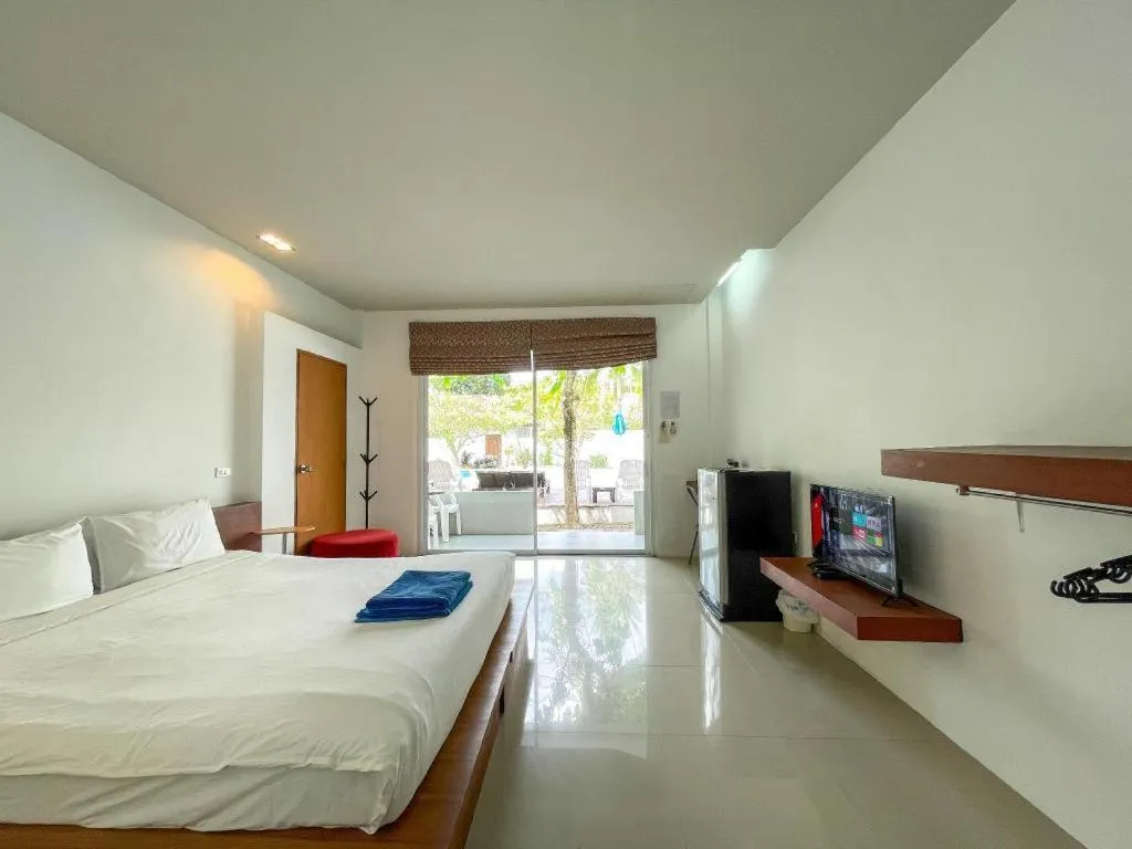 Bed in The Living Pool Villas