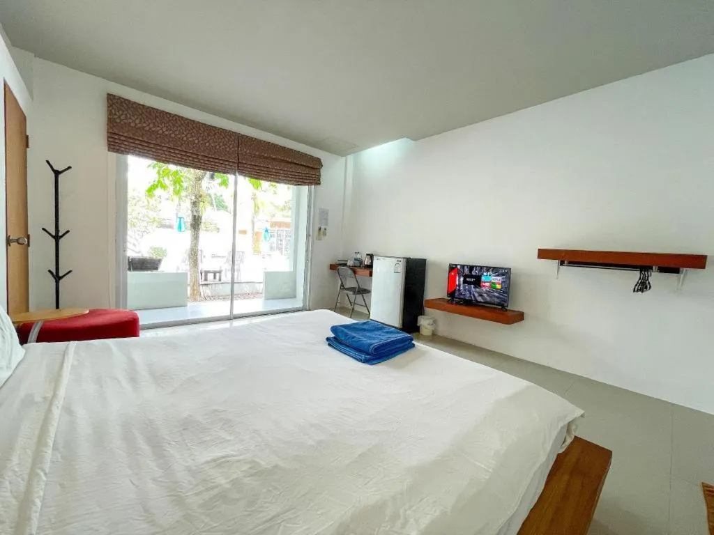 Bed in The Living Pool Villas