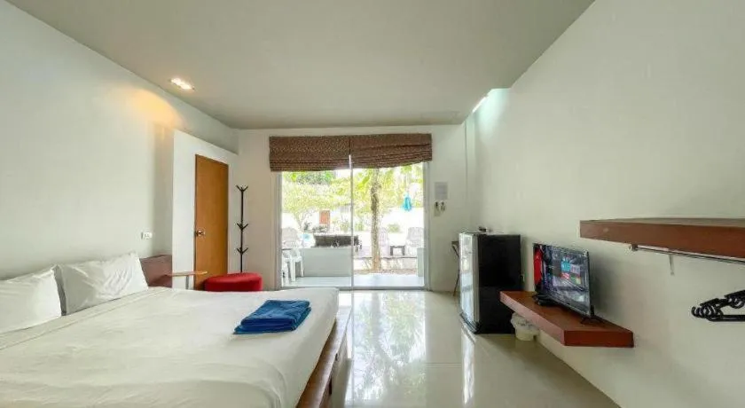 Bed in The Living Pool Villas