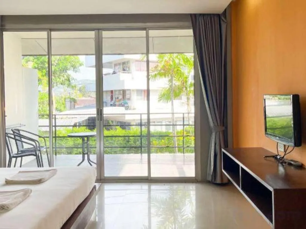 Bed in The Living Pool Villas