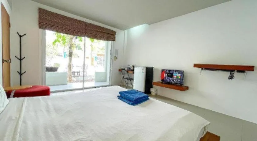 Bed in The Living Pool Villas