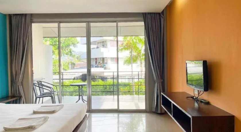 Bed in The Living Pool Villas