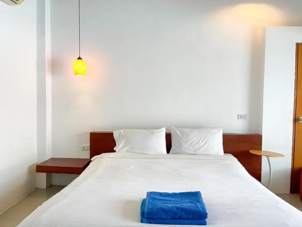 Bed in The Living Pool Villas