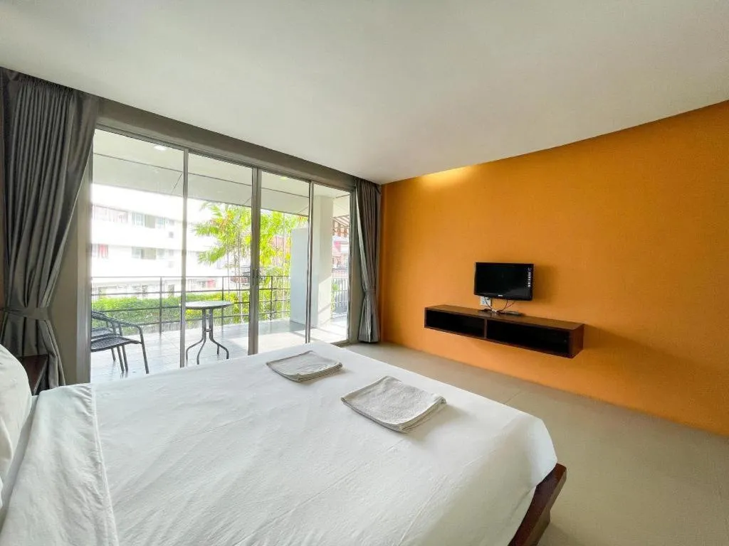 Bed in The Living Pool Villas