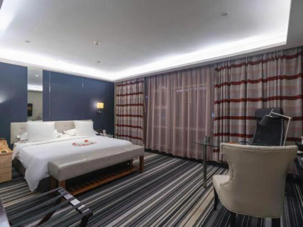 Bed in Urumqi Bayinhe Hotel