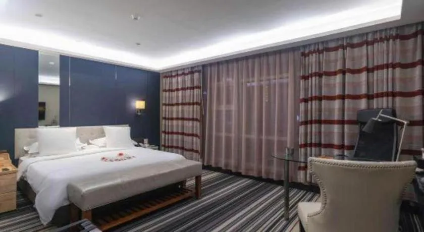 Bed in Urumqi Bayinhe Hotel