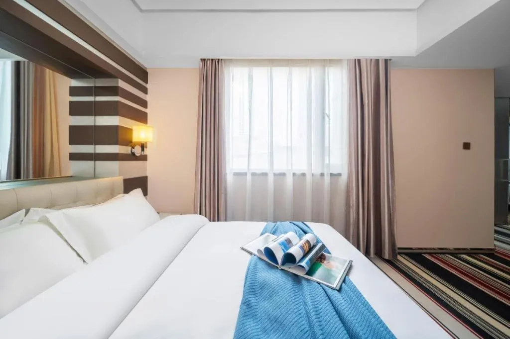 Bed in Urumqi Bayinhe Hotel