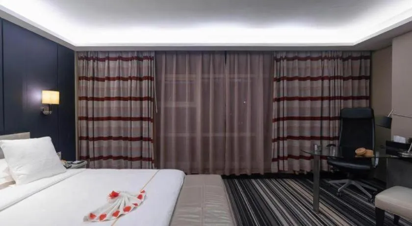 Bed in Urumqi Bayinhe Hotel