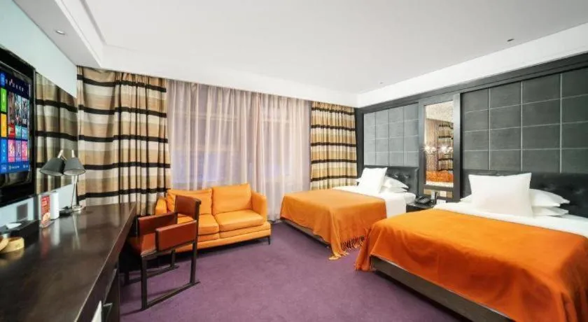 Bed in Urumqi Bayinhe Hotel