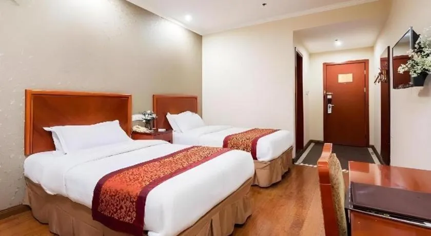 Bed in GreenTree Inn Jiangsu Wuxi Meiyuan Kaiyuan Temple Subway Master Station Express Hotel