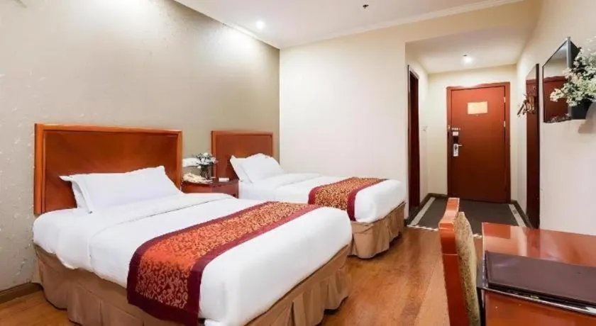 Bed in GreenTree Inn Jiangsu Wuxi Meiyuan Kaiyuan Temple Subway Master Station Express Hotel