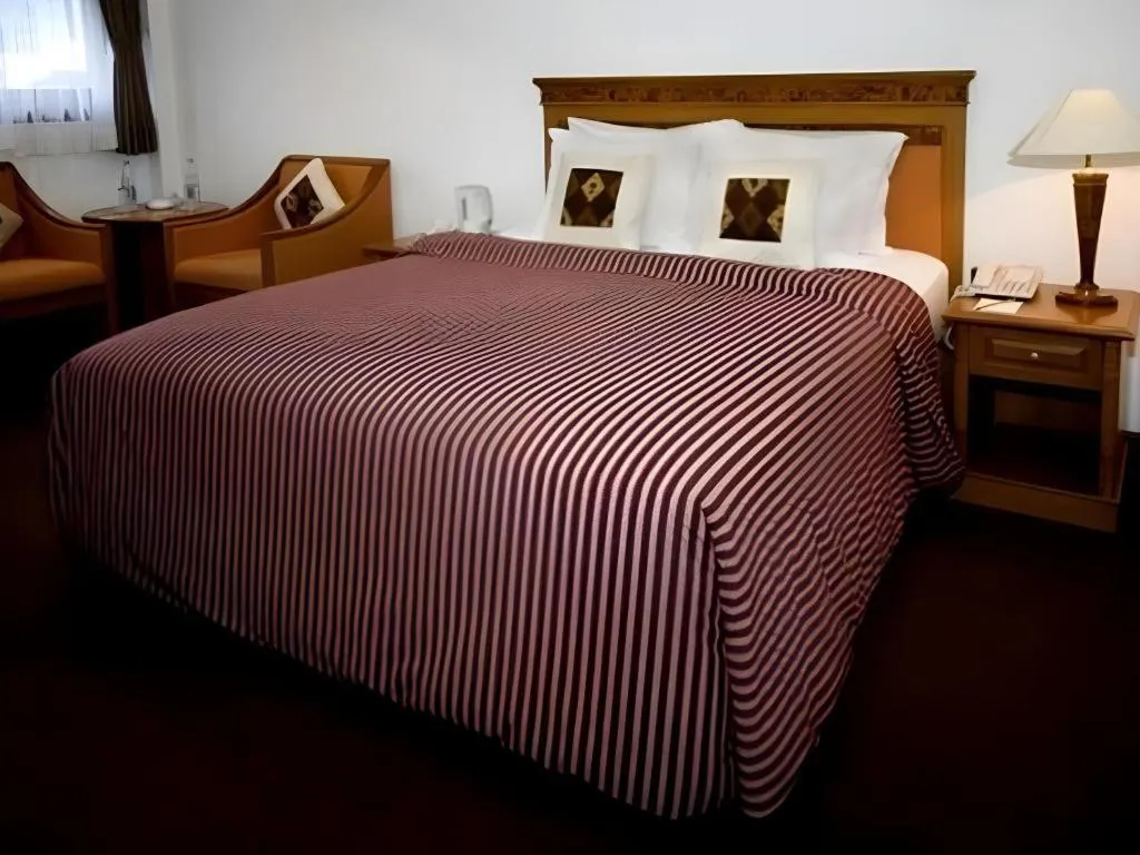 Bed in Enhaii Hotel