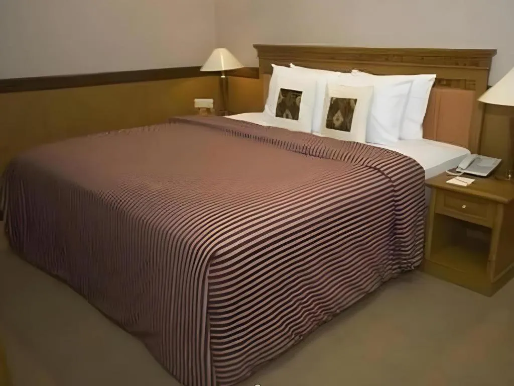 Bed in Enhaii Hotel