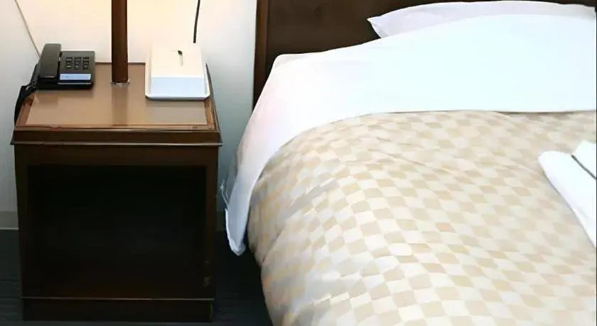 Bed in Hotel Akai Bed in Hotel Akai