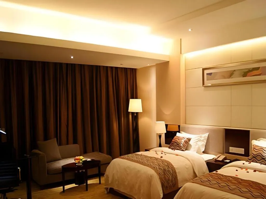Bed in Fortune Hotel Longyan
