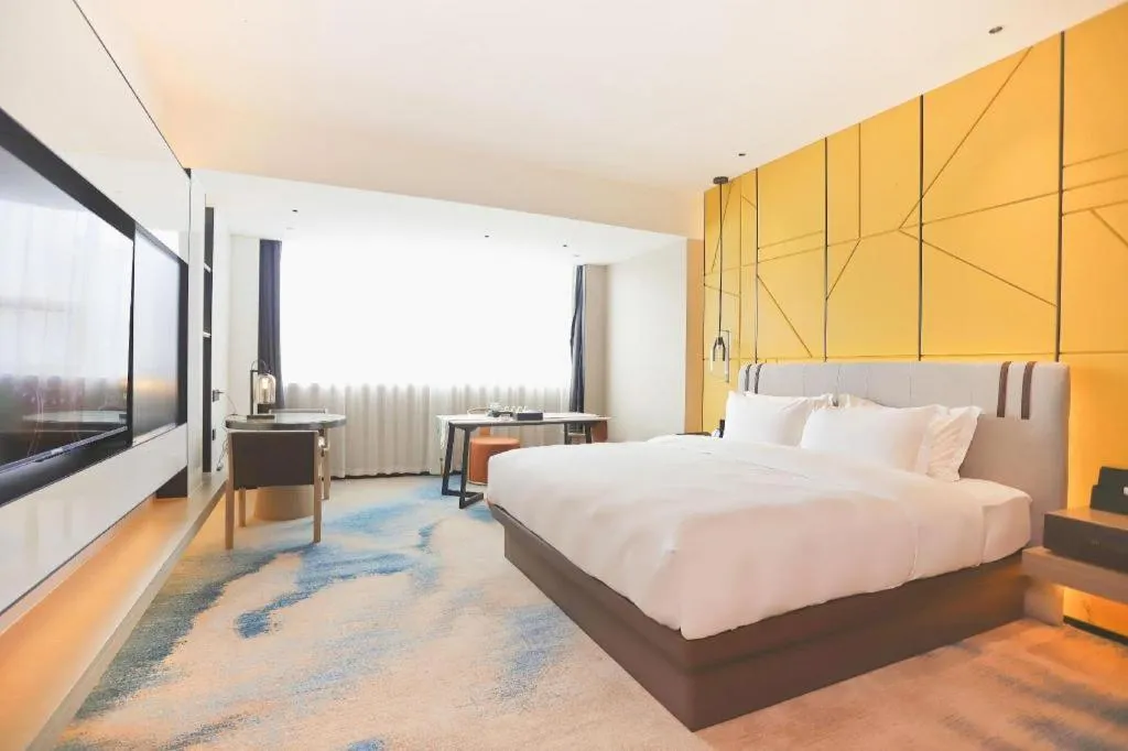 Bed in Fortune Hotel Longyan