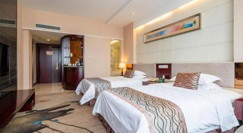 Bed in Fortune Hotel Longyan