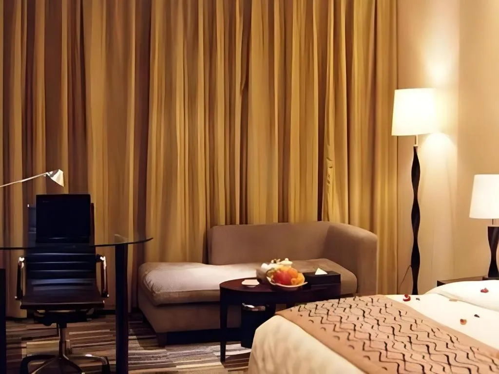 Bed in Fortune Hotel Longyan