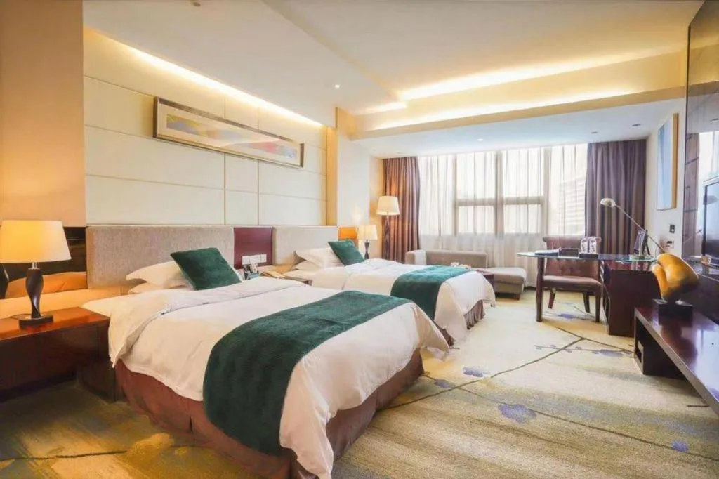 Bed in Fortune Hotel Longyan