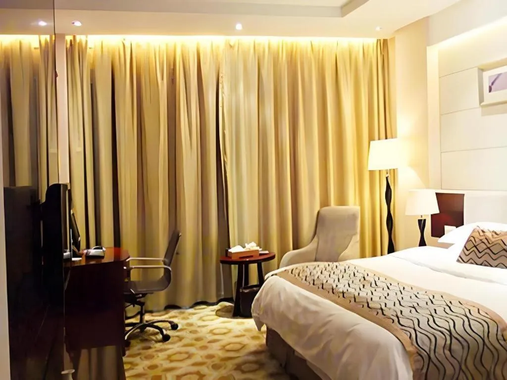 Bed in Fortune Hotel Longyan