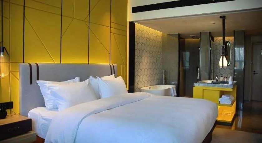 Bed in Fortune Hotel Longyan