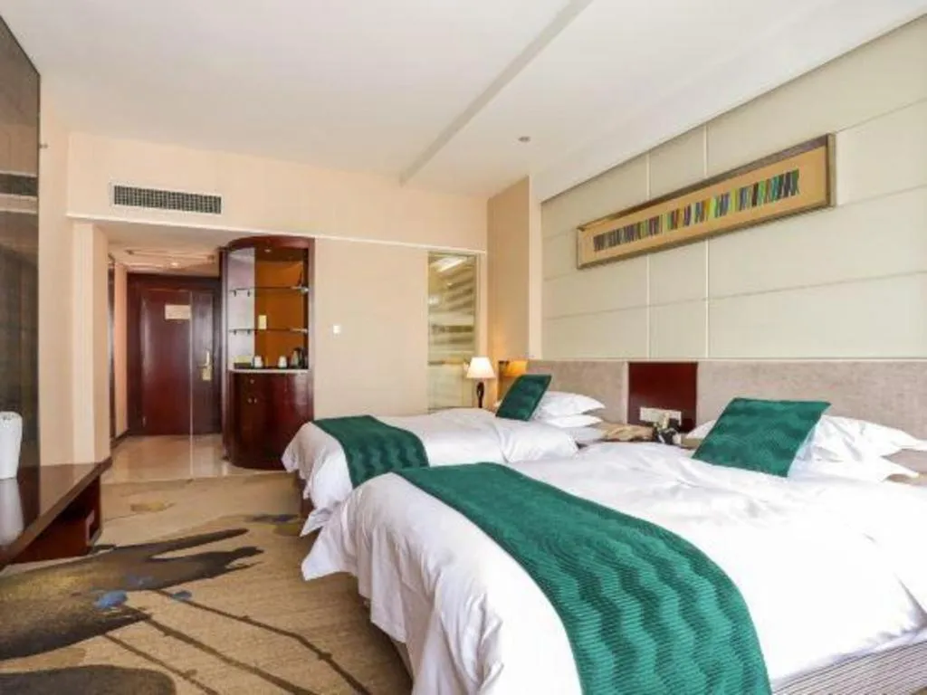 Bed in Fortune Hotel Longyan