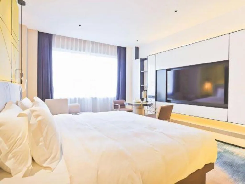 Bed in Fortune Hotel Longyan
