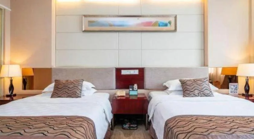 Bed in Fortune Hotel Longyan