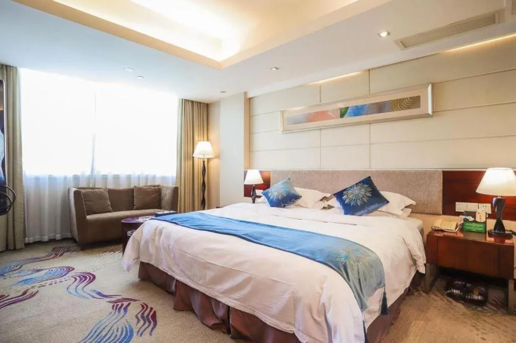 Bed in Fortune Hotel Longyan