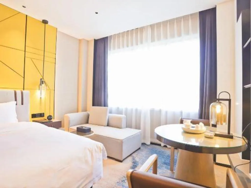 Bed in Fortune Hotel Longyan