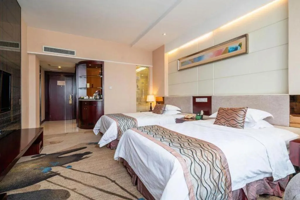 Bed in Fortune Hotel Longyan