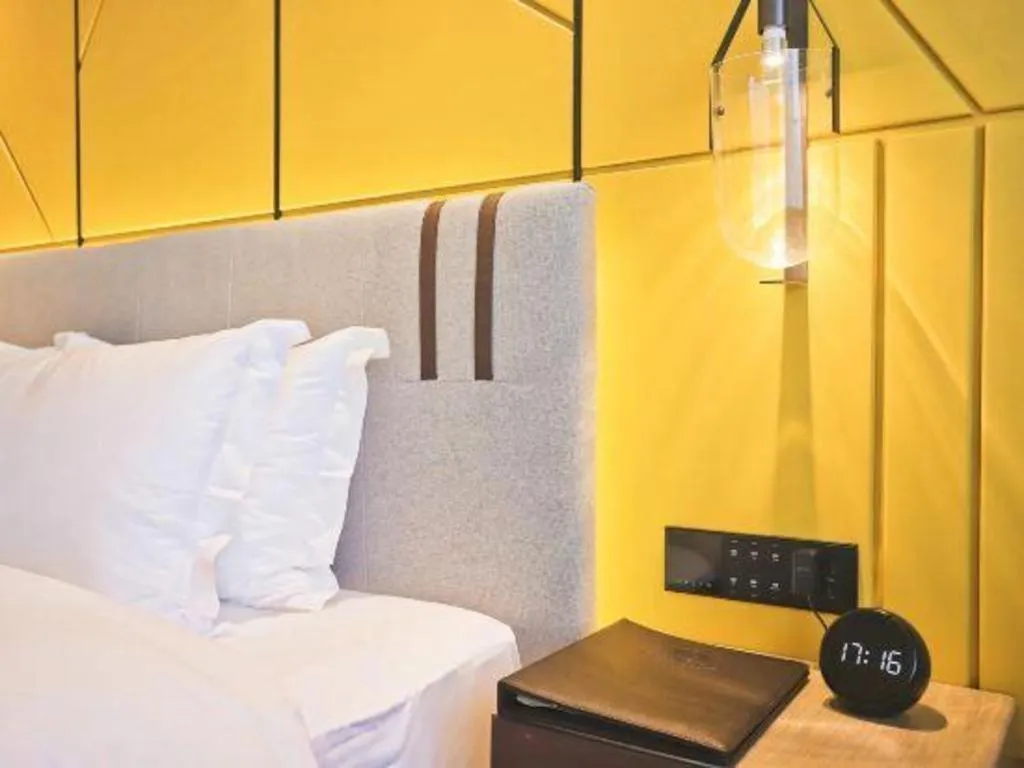 Bed in Fortune Hotel Longyan