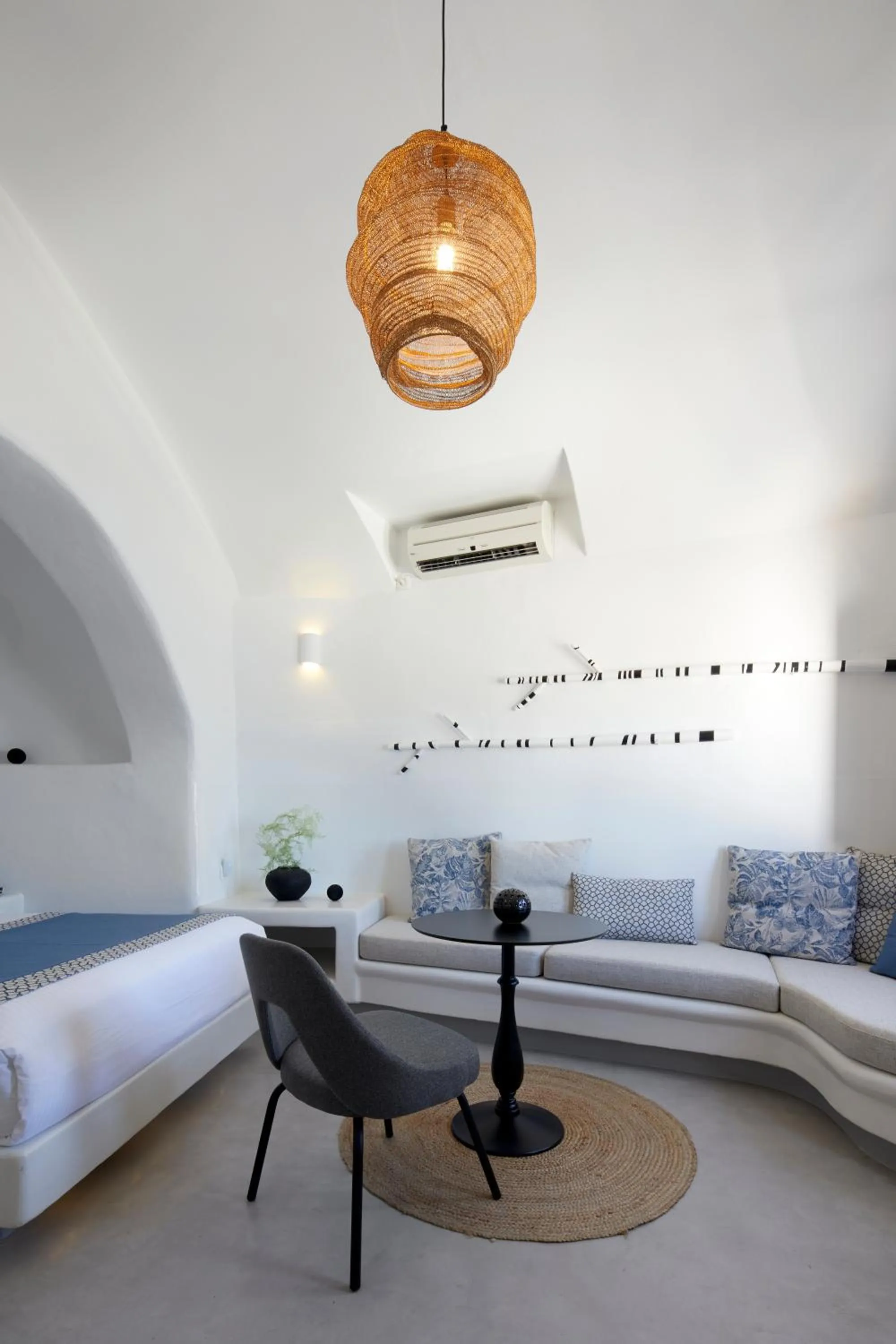 Seating area, Bed in Filotera Suites