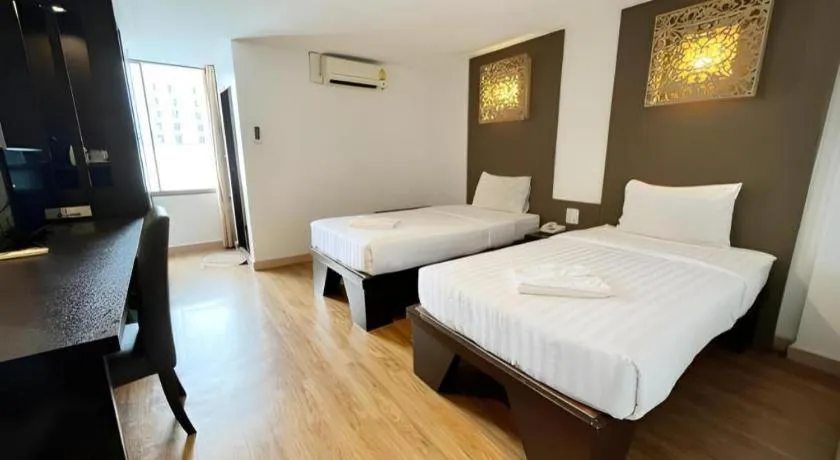 Bed in Laemchabang City Hotel